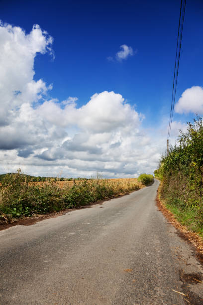 istock Single lane country road Hollingbourne 1494556201
