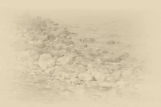 Photo of Dreamlike image of rocks by the sea
