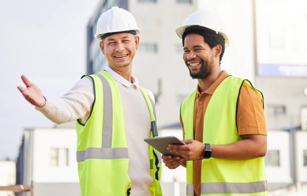 istock Tablet, collaboration or architecture with an engineer man and designer planning on a construction site. Architect, building and teamwork with men working together to design a development project 1494557576