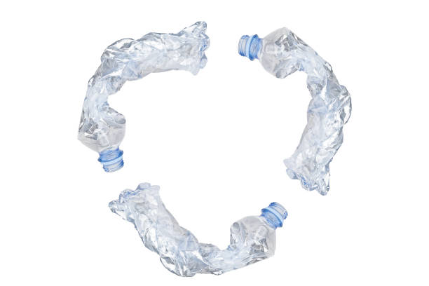 istock Recycle symbol of crumpled waste plastic bottles 1494561763