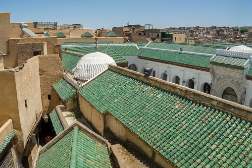 Fez, Morocco - May 15, 2023: UNESCO protected Medina of Fez El Bali, a world heritage site, Northern Morocco.  View from Al-Attarine Madrasa   rooftop of the Al-Qarawiyyin mosque  Fes