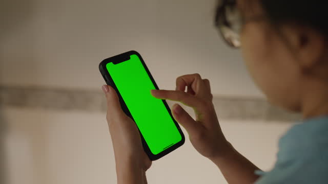 Using smart phone displaying Green screens