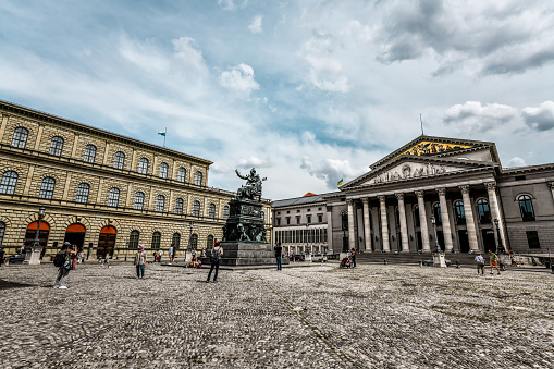 Vienna, Austria - July  26, 2020: National library with with an equestrian statue of emperor Joseph 2nd in front. It is the biggest baroque library in europe.