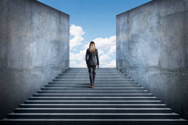 istock Businesswoman Climbing Steps 1494573001