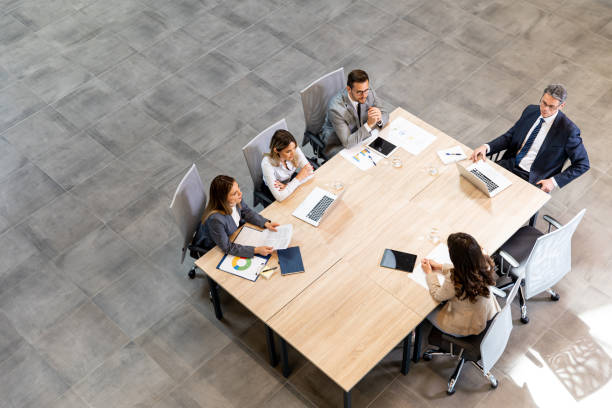 istock Aerial view at young startup team working in the office 1494573334