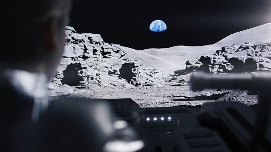 Astronaut inside a Moon rover. Exploring the Moon's rocky surface and conducting research for future of the humanity. NASA Public Domain Imagery.