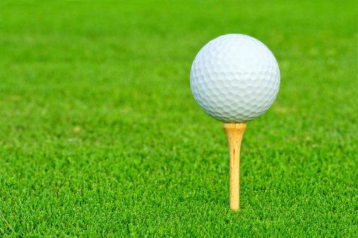 Golf ball on a tee closeup