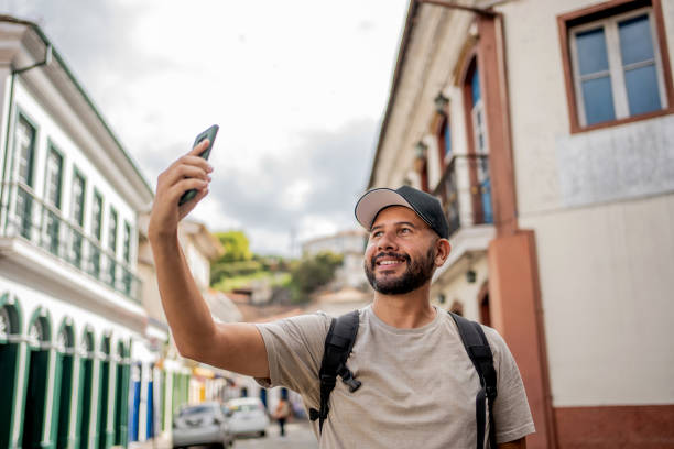 istock Tourist taking selfie in historic city 1494576877