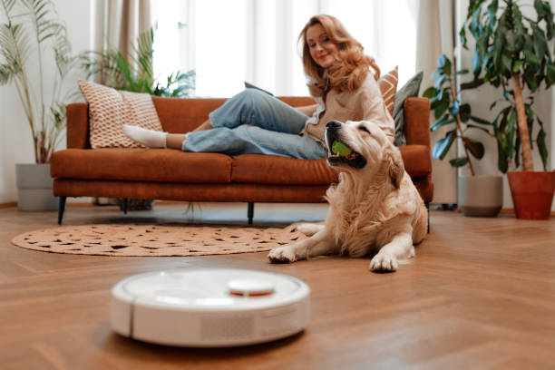 istock Couple with dog at home 1494578430