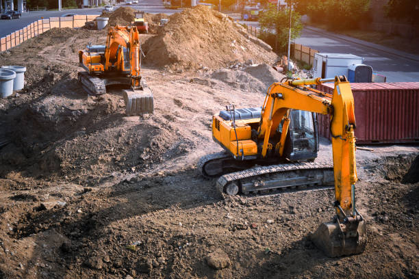 istock Two excavators are digging the ground for a foundation. 1494582824