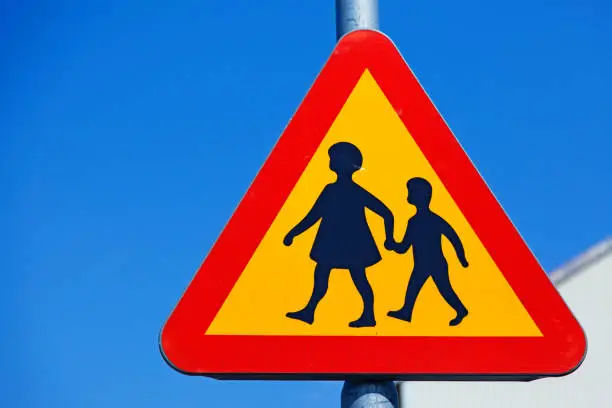 traffic sign warning for children crossing the road