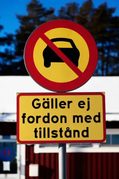 traffic sign with the text does not apply to vehicles with a permit