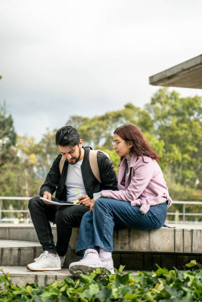 istock Student friends talking outdoors 1494588713