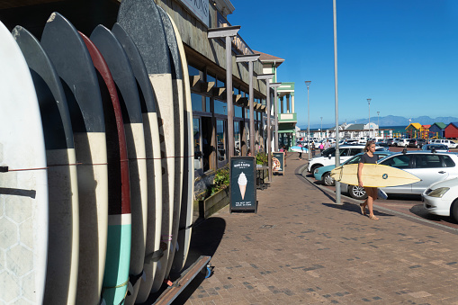 Cape Town 20 January 2023. Tourists rent surf boards at Muizenberg, Surfers Corner.  Surfers Corner is an internationally renowned surfing spot for beginners and professionals alike.