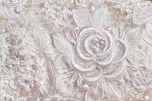 Detail from the embroidered bodice of a wedding dress