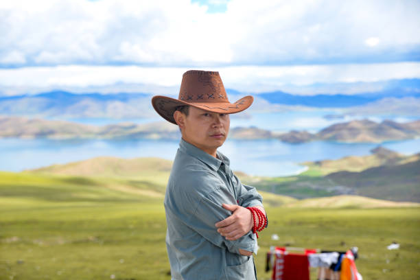 A man wears a hat outdoors