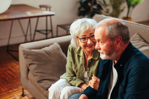 istock Senior couple looking happy after therapy session 1494603226