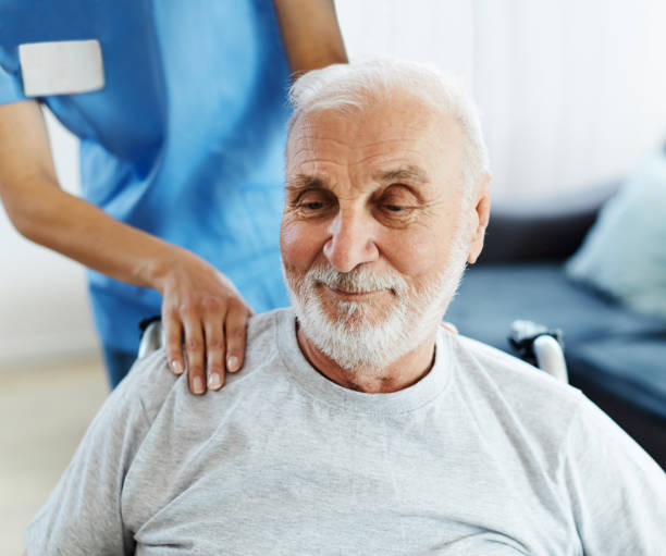 istock nurse doctor senior care exercise physical therapy ecercising help assistence retirement home  elderly man 1494610166