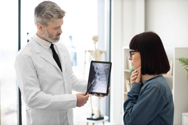 istock Professional diagnosing lady's injury via scans on tablet 1494610584