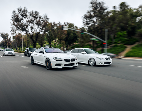 Seattle, WA, USA
May 23, 2023
White BMW M5 and M6 driving on the street together