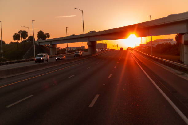 istock Traffic on the highway road at sunrise 1494619488