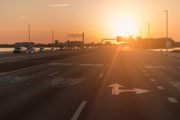 istock Traffic on the highway road at sunrise 1494619502
