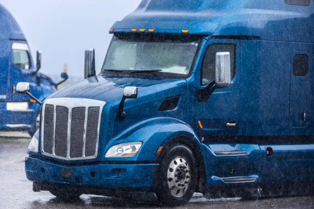 istock A blue semi truck driving in the rain 1494619605