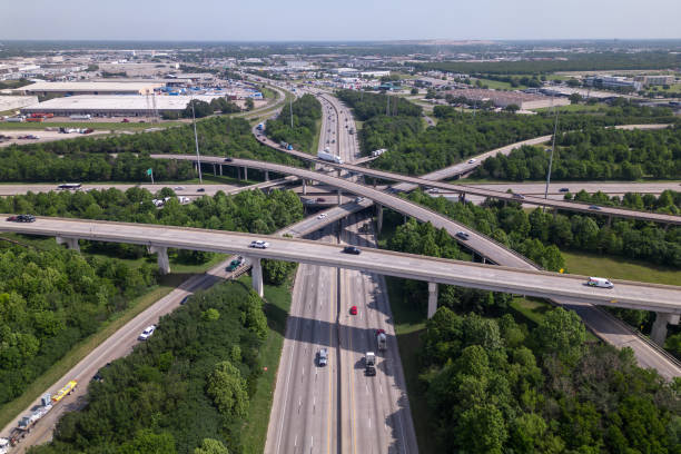 istock An aerial view of a highway intersection with a traffic intersection. 1494619692