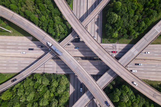 istock An aerial view of a highway intersection with a traffic intersection. 1494619800