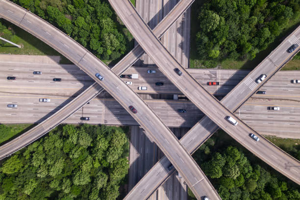istock An aerial view of a highway intersection with a traffic intersection. 1494619827
