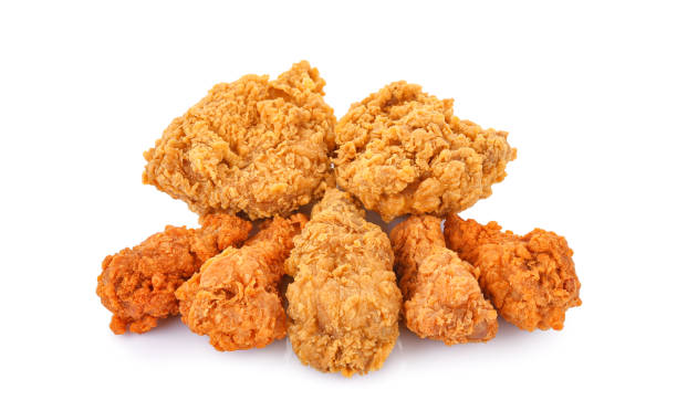 istock Heap of fried chicken isolated on white 1494625056