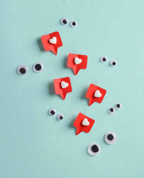 istock Goggle eyes with social media likes on blue background. Creative minimal layout 1494625729