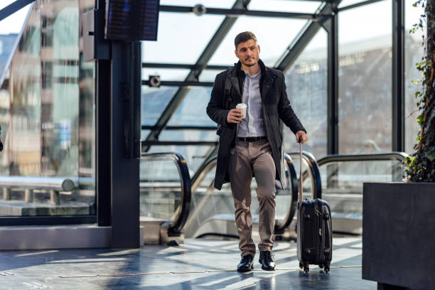 istock Serious Businessman Walking In The Train Station 1494628544