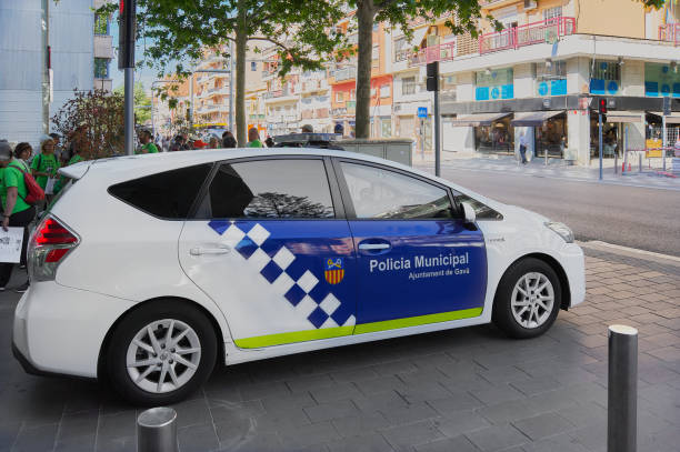 Gavá municipal pólice car. Gava - May 30, 2023: Gava municipal police car controlling a neighborhood demonstration. police policewoman women spain stock pictures, royalty-free photos & images