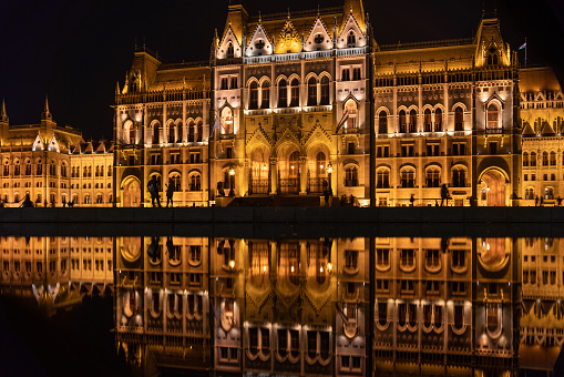 The awe-inspiring beauty of the Budapest Parliament Building, an architectural masterpiece set on the banks of the majestic Danube River. This iconic landmark of Hungary stands as a testament to the city's rich history and serves as the seat of government. With its intricate neo-Gothic design and symmetrical facades, the Budapest Parliament Building exudes grandeur and leaves a lasting impression on visitors.