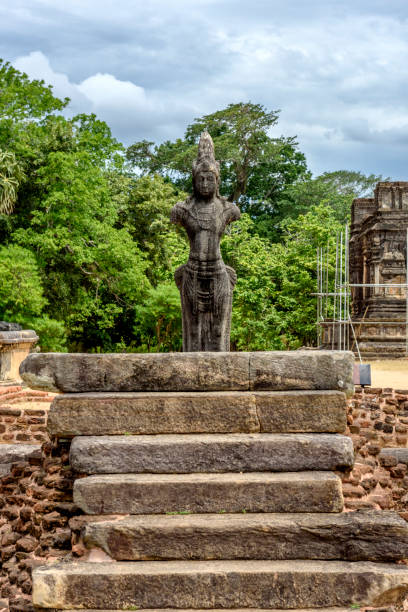 Bodhisattva statue at the old Mudu Maha Vihara temple in coastal sand dunes at Pottuvil, Arugam Bay, Eastern Province, Sri Lanka