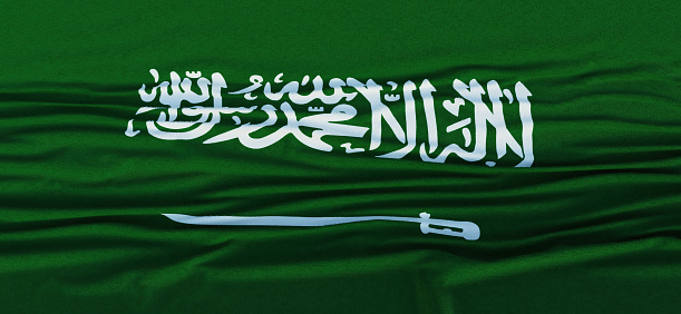 High quality 3d render of a Saudi Arabian flag waving with wind over blue sky. Horizontal composition with copy space.