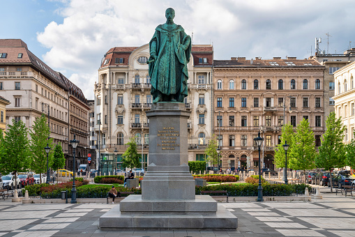 Warsaw, Poland - August 25, 2014: Bust of Julius Caesar, one of Rome's most famous statesmen, politicians and generals, located  in a garden with sculptures. Decorated garden sculpture.