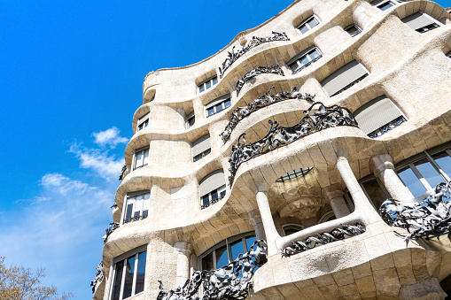 Barcelona, Spain - August 26, 2012:House of Casa Mila. Modernist house Casa Mila called La Pedrera designed by Antoni Gaudi
