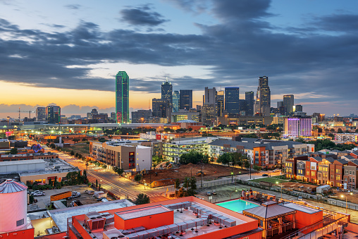 Dallas, Texas, USA downtown city skyline at dusk.