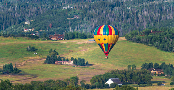 Balloons coming in for a landing at Chatfield Reservoir, Colorado