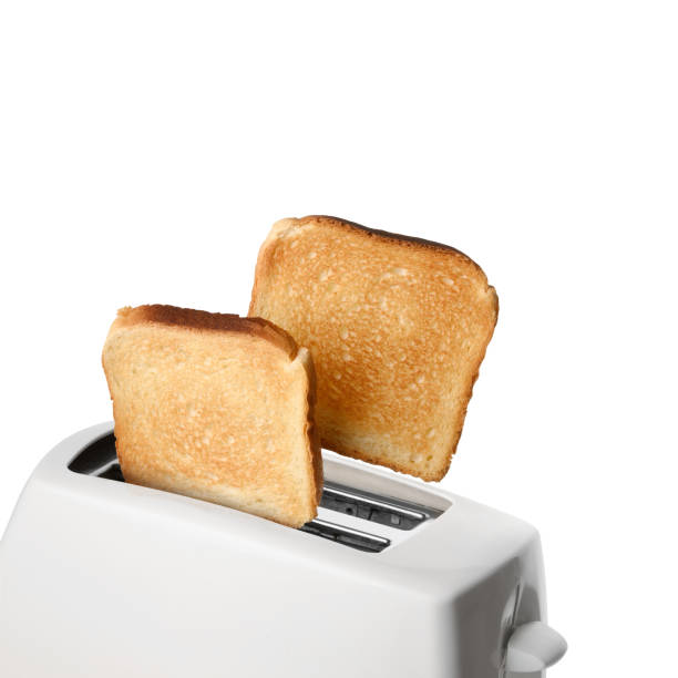 istock Roasted toast bread and toaster over white background. 1494642079