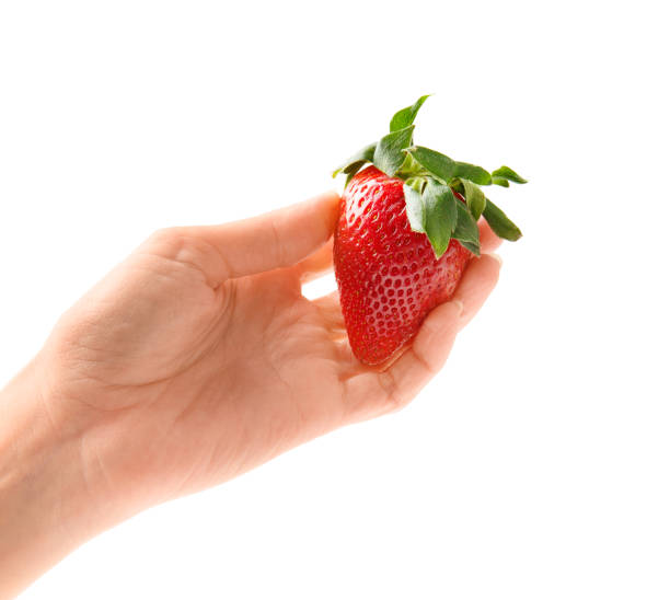istock strawberry in hand on white background isolation 1494644133