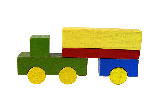 Camion of wooden blocks, traditional toy on white background