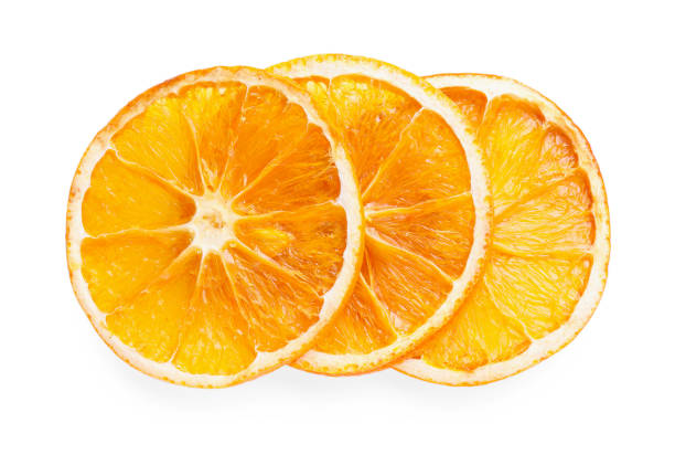 istock Delicious dry orange slices on white background, top view 1494646323