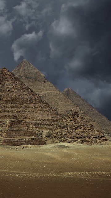 Great pyramids and storm clouds