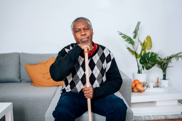 istock Senior Man Battles Inner Turmoil on the Couch 1494649148
