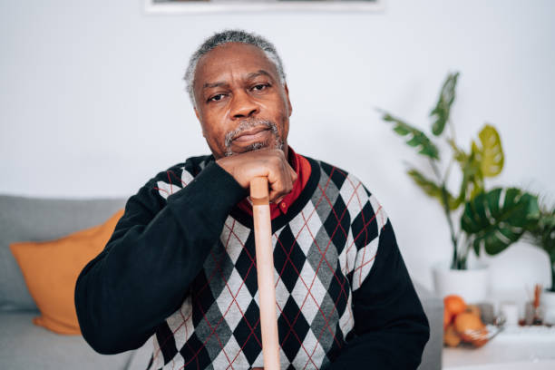 istock Senior Man Contemplates Life's Challenges on the Couch 1494649149