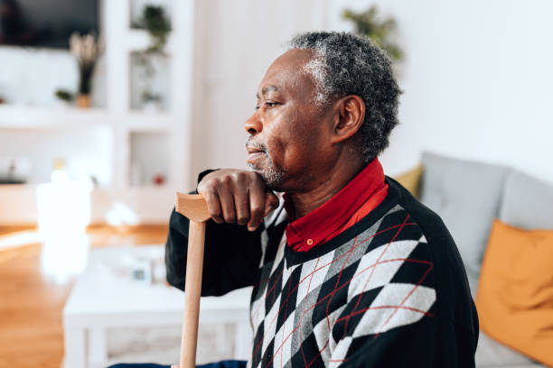 istock Senior Man's Struggle with Depression on the Couch 1494649170