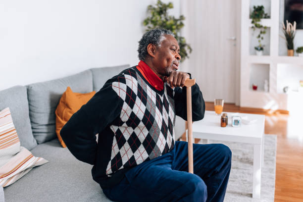 istock Senior Man Faces the Unrelenting Discomfort 1494649179